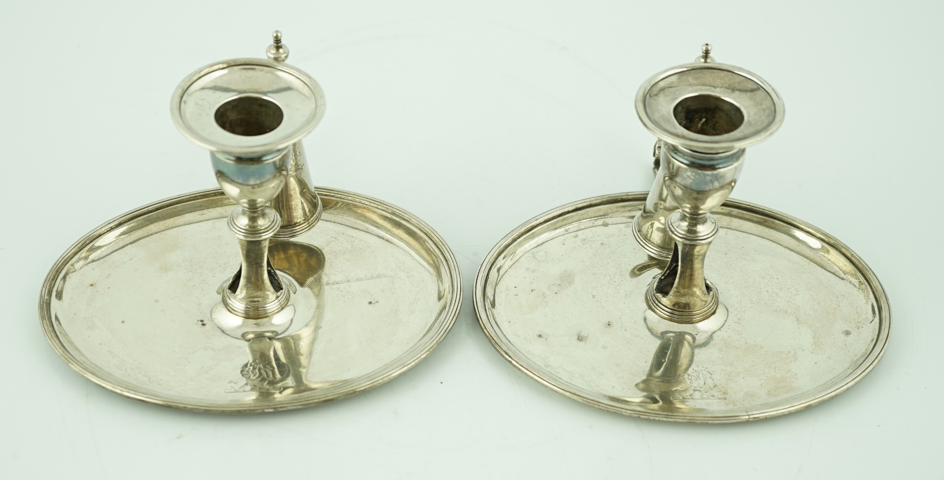 A pair of George III silver chambersticks, by Walter Brind